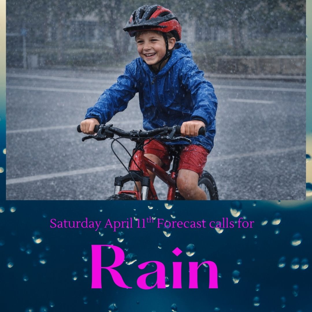 Boy riding his bike in the rain